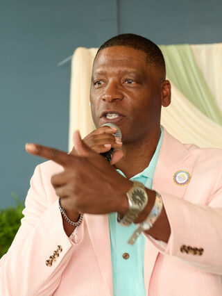 A speaker addresses guests at Heritage Social Brunch